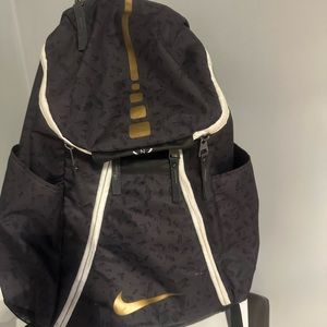 Nike Black large unisex Book Bag can be used as travel Bag with pockets on side